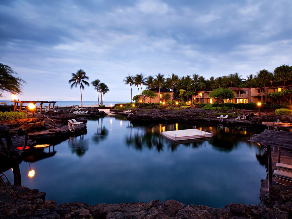 the-kings-pond-at-the-four-seasons-resort-hualalai-a-pool-of-18-million-gallons-is-carved-out-of-natural-lava-rock-swim-with-manta-rays-and-more-than-3000-tropical-fish-in-this-fresh-and-ocean-water-pool