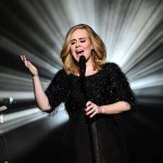 Adele, in occasione degli NRJ Music Awards che si sono tenuti a Cannes, ha scelto di indossare per la sua performance un abito da cocktail di seta nero con corpino e maniche effetto plumage in lurex, della collezione Giorgio Armani Privè. Mandatory Credit: 
Photo by GHNASSIA/SIPA/REX Shutterstock